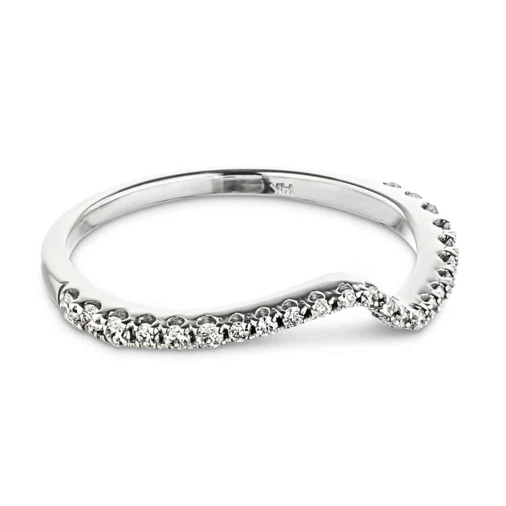 Shown here with accented diamonds in recycled 14K white gold. | Accented diamond curved wedding band.