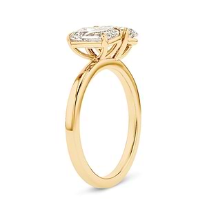 toi et moi with an emerald cut and oval cut lab grown diamond