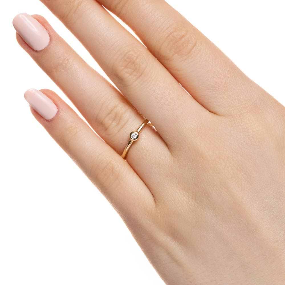 Shown with a 0.03ct recycled diamond in recycled 14K yellow gold 