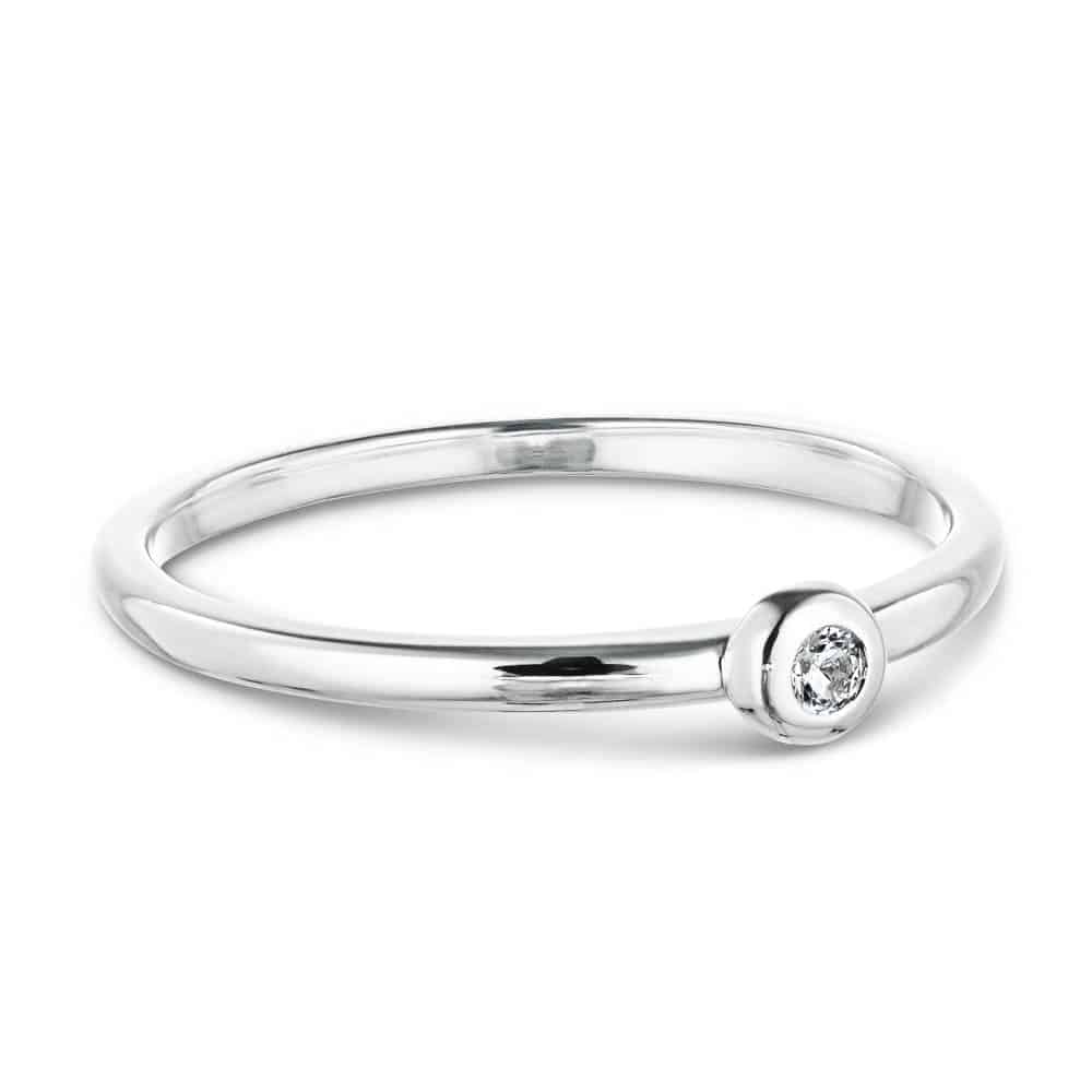 Shown with a 0.03ct recycled diamond in recycled 14K white gold 