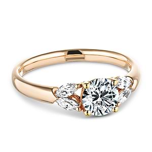 Affordable diamond accented engagement ring with 0.75ct round cut lab grown diamond center and 0.20ctw marquise cut side stones in 14k rose gold
