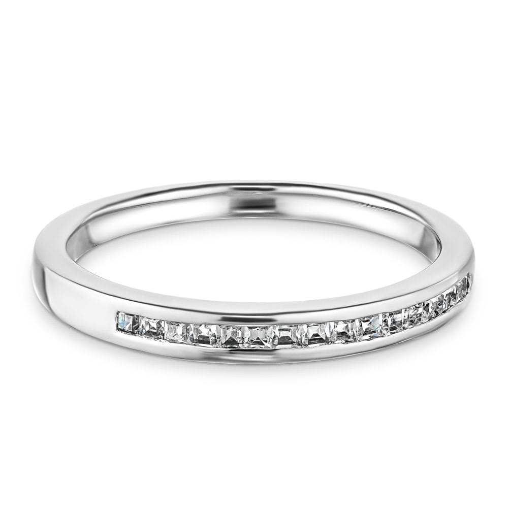 Channel set diamond accented wedding band 
