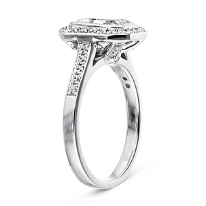 Antique style accented halo engagement ring with 1ct emerald cut lab grown diamond and peek-a-boo diamonds in 14k white gold shown from side