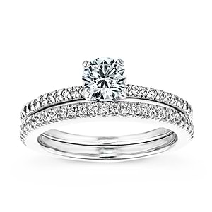  diamond accented engagement ring Shown with a 1.0ct Round cut Lab-Grown Diamond with accenting diamonds on the band in recycled 14K white gold with matching wedding band