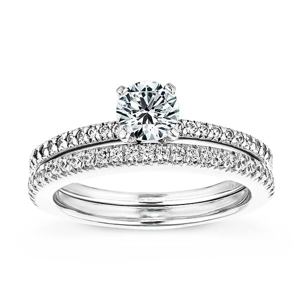 Shown with a 1.0ct Round cut Lab-Grown Diamond with a diamond accented band in recycled 14K white gold with matching wedding band | accented diamond wedding set Shown with a 1.0ct Round cut Lab-Grown Diamond with a diamond accented band in recycled 14K white gold with matching wedding band