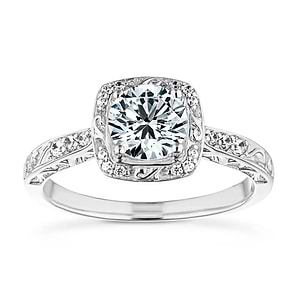 Beautiful vintage style cushion shaped halo engagement ring with 1ct round cut lab grown diamond in diamond accented filigree detailed 14k white gold band