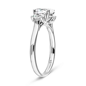 Unique three stone trellis set lab grown diamond engagement ring in white gold shown from side