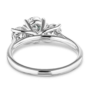 Three stone trellis set engagement ring in white gold shown from back