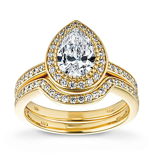 Celebrity inspired diamond accented halo wedding ring set with lab diamonds in 14k yellow gold