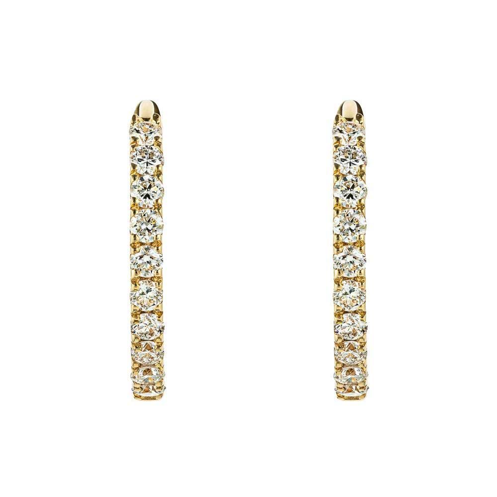 Pair of 14 millimeter yellow gold Huggie earrings