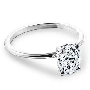 Simple traditional solitaire engagement ring with 1ct oval cut lab grown diamond in 14k white gold band
