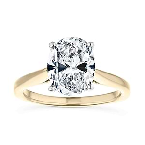 Two tone hidden halo engagement ring with 2ct oval cut lab grown diamond in 14k yellow gold and 14k white gold