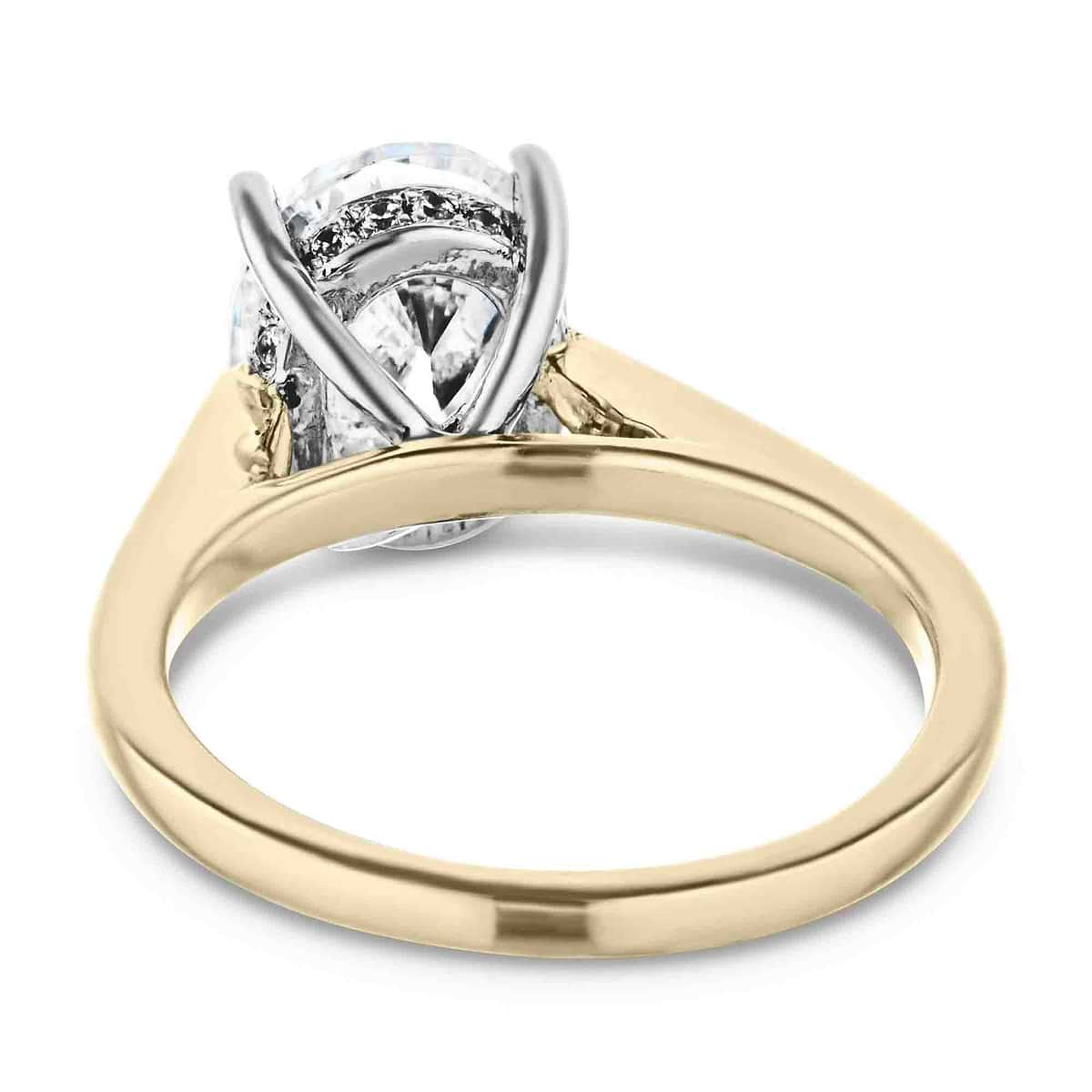 Shown with 2ct Oval Cut Lab Grown Diamond in 14k Yellow Gold and 14K White Gold