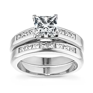  engagement ring Shown with a 1.0ct Princess cut Lab-Grown Diamond with channel set accenting diamonds in recycled 14K white gold with matching wedding band