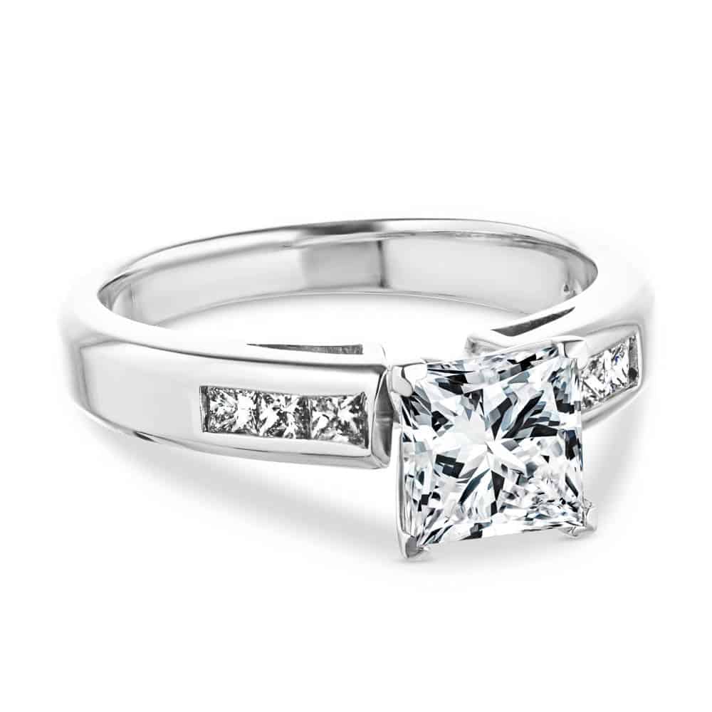 Melanie Wedding Set featuring a princess cut 1.50ct Diamond Hybrid® engagement ring in recycled 14K white gold with .30ctw side stones and a matching wedding band with .40ctw channel set stones | Melanie Wedding Set 1.50ct Diamond Hybrid engagement ring wedding band