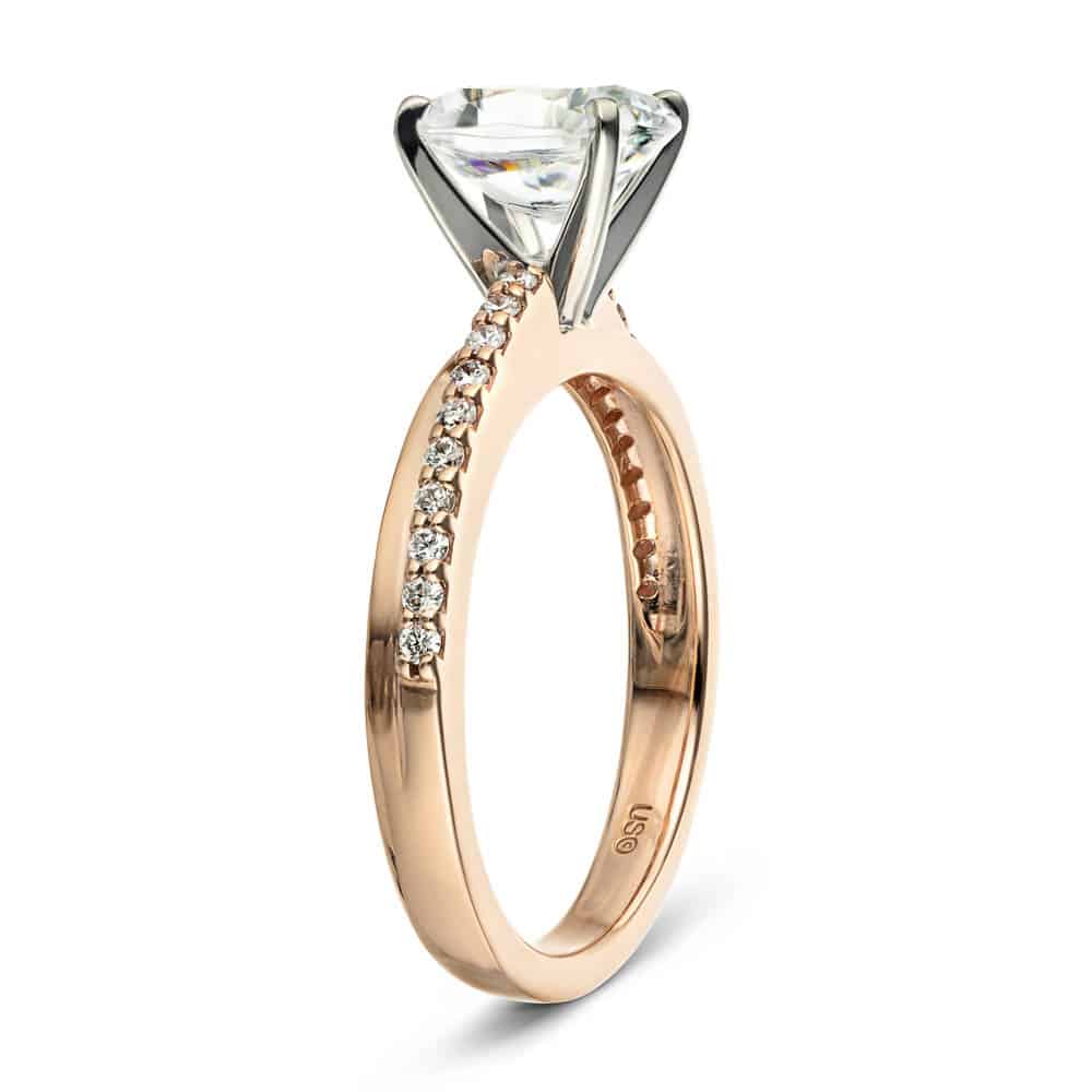 Shown with 1.5ct Oval Cut Lab Grown Diamond in 14k Rose Gold|Beautiful unique engagement ring with asymmetrical pave set accenting diamonds set with 1.5ct oval cut lab grown diamond in 14k rose gold band