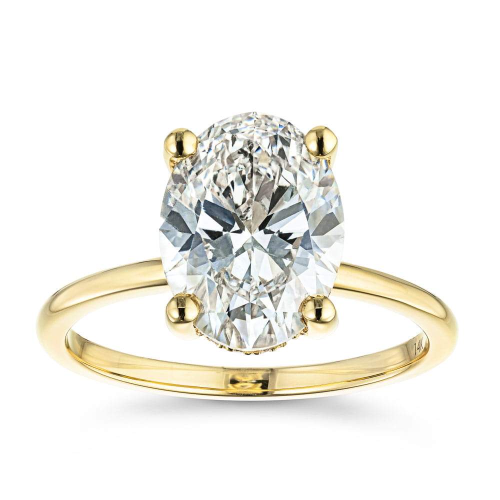 Shown with 3ct Oval Cut Lab Grown Diamond in 14k Yellow Gold|Elegant hidden halo engagement ring with 4 prong set 3ct oval cut lab grown diamond in thin 14k yellow gold band