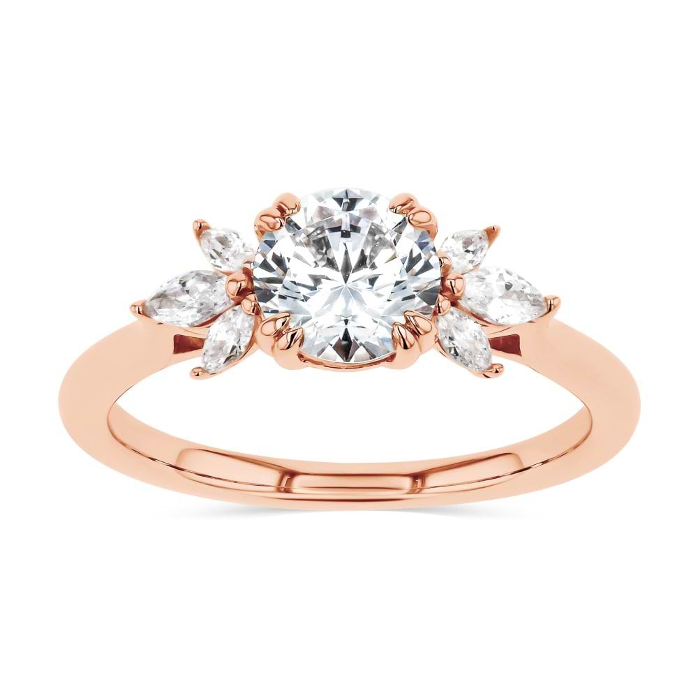 Shown here with a 1.0ct Round Cut Lab Grown Diamond center stone in 14K Rose Gold|floral inspired diamond accented engagement ring with round cut lab grown diamond center stone set in 14k rose gold metal