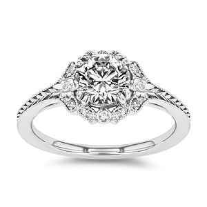 diamond halo engagement ring with chevron detailed band set with a round cut lab grown diamond center stone in 14k white gold recycled metal