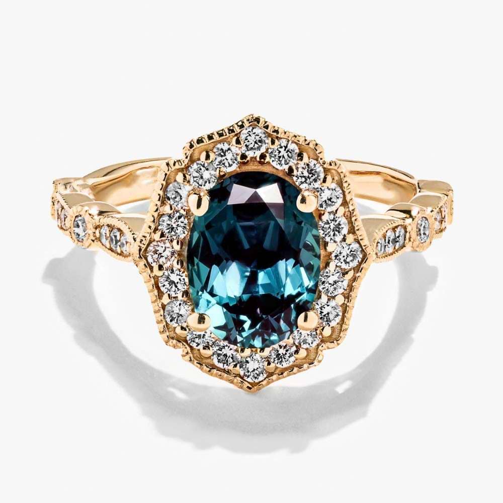 Shown in 14K Yellow Gold with an Oval Cut Lab Created Alexandrite Gemstone
