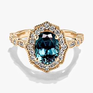 diamond accented vintage stackable ring with an oval cut lab created alexandrite gemstone in 14k yellow gold