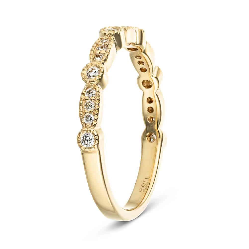 Diamond accented wedding band with filigree detail in recycled 14K yellow gold made to fit the Paris Engagement Ring 