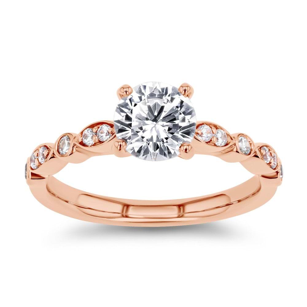 Shown here with a 1.0ct Round Cut Lab Grown Diamond center stone in 14K Rose Gold|diamond accented engagement ring with round cut lab grown diamond center stone set in 14k rose gold recycled metal