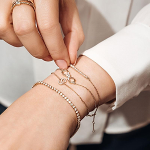  diamond accented letter initial bracelet in gold