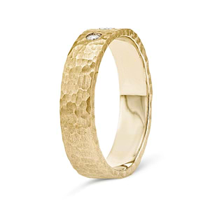 lab grown diamond accented band in 14k yellow gold metal with satin hammer finish