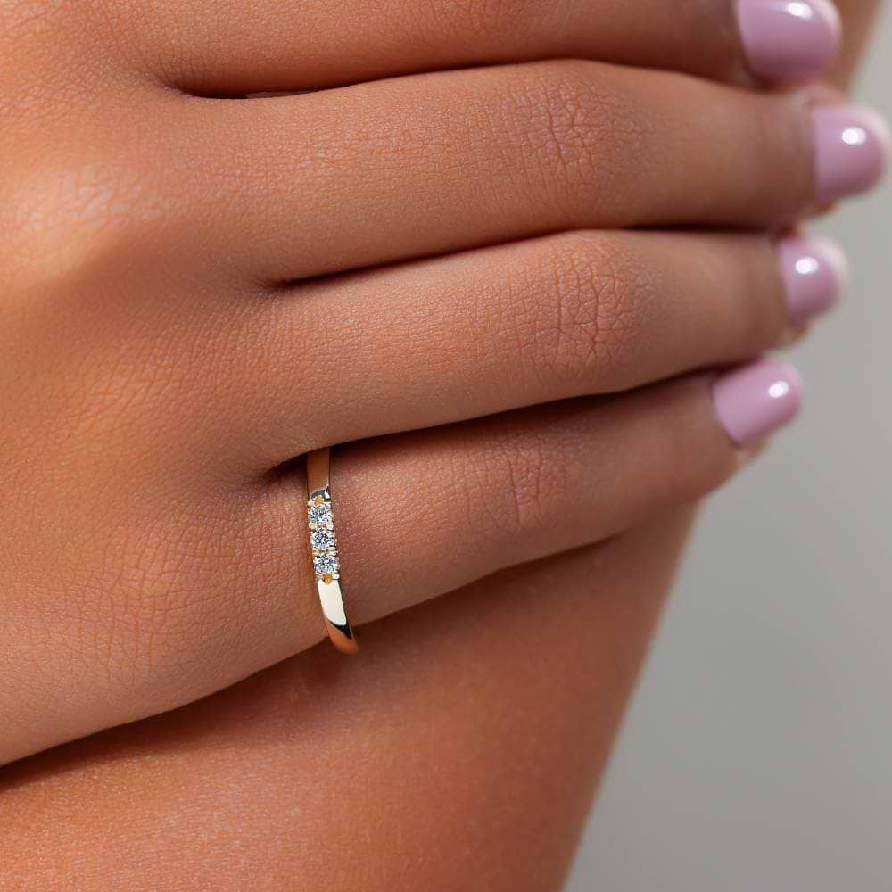 Three Lab-Grown Diamonds set in a simple band in recycled 10K rose gold | fashion Three Lab-Grown Diamonds set in a simple band in recycled 10K rose gold