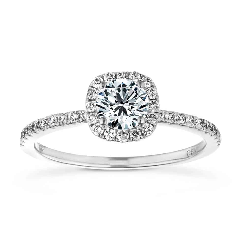 Shown with a 1.0ct Round cut Lab-Grown Diamond with a diamond accented halo and accented band in recycled 14K white gold | halo engagement ring Shown with a 1.0ct Round cut Lab-Grown Diamond with a diamond accented halo and accented band in recycled 14K white gold