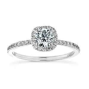  halo engagement ring Shown with a 1.0ct Round cut Lab-Grown Diamond with a diamond accented halo and accented band in recycled 14K white gold