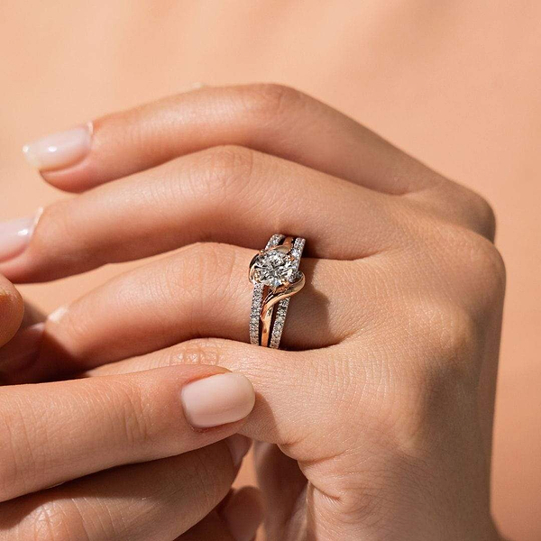 Vine Engagement ring shown with a round cut 1.0ct Lab-Grown Diamond center stone and a recycled 14K white  and rose gold band accented with recycled diamonds | Vine Engagement ring round cut 1.0ct Lab-Grown Diamond center stone recycled 14K white and rose gold band accented with recycled diamonds