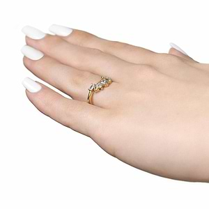 Lab grown diamond accented wedding band with contour design set in 14k yellow gold