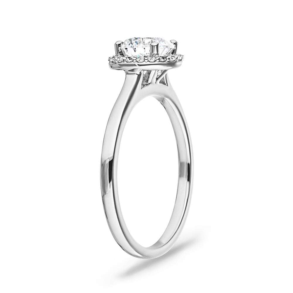Shown with 1ct Round Cut Lab Grown Diamond in 14k White Gold|Diamond halo engagement ring with a 1ct round cut lab grown diamond in 14k white gold shown from side