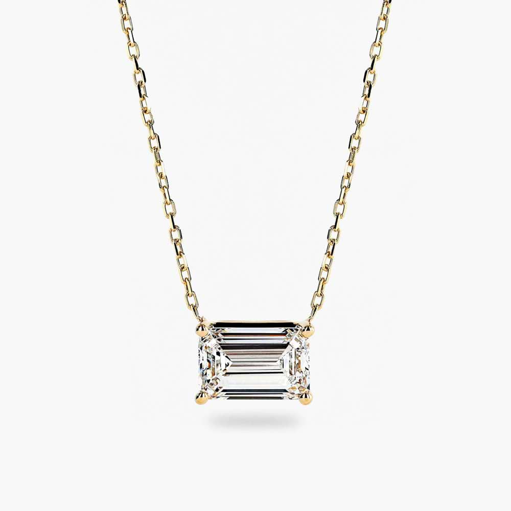 Shown in 14K Yellow Gold|basket pendant featuring an emerald cut lab grown diamond set in recycled yellow gold by MiaDonna