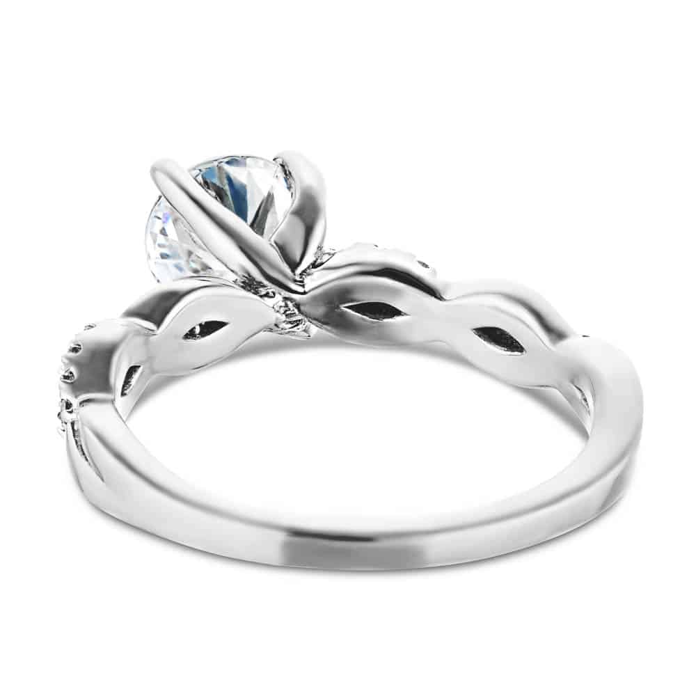 Shown with 1ct Round Cut Lab Grown Diamond in 14k White Gold|Nature inspired engagement ring with twisted diamond accented band featuring 1ct round cut lab grown diamond in 14k white gold shown from back