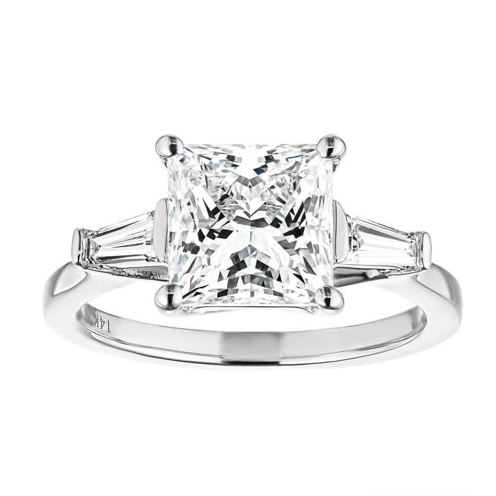 Shown with 2.5ct Princess Cut Lab Grown Diamond set in 14k White Gold|Beautiful three stone engagement ring with trellis set 2.5ct princess cut lab grown diamond amid baguette side stones in 14k white gold shown