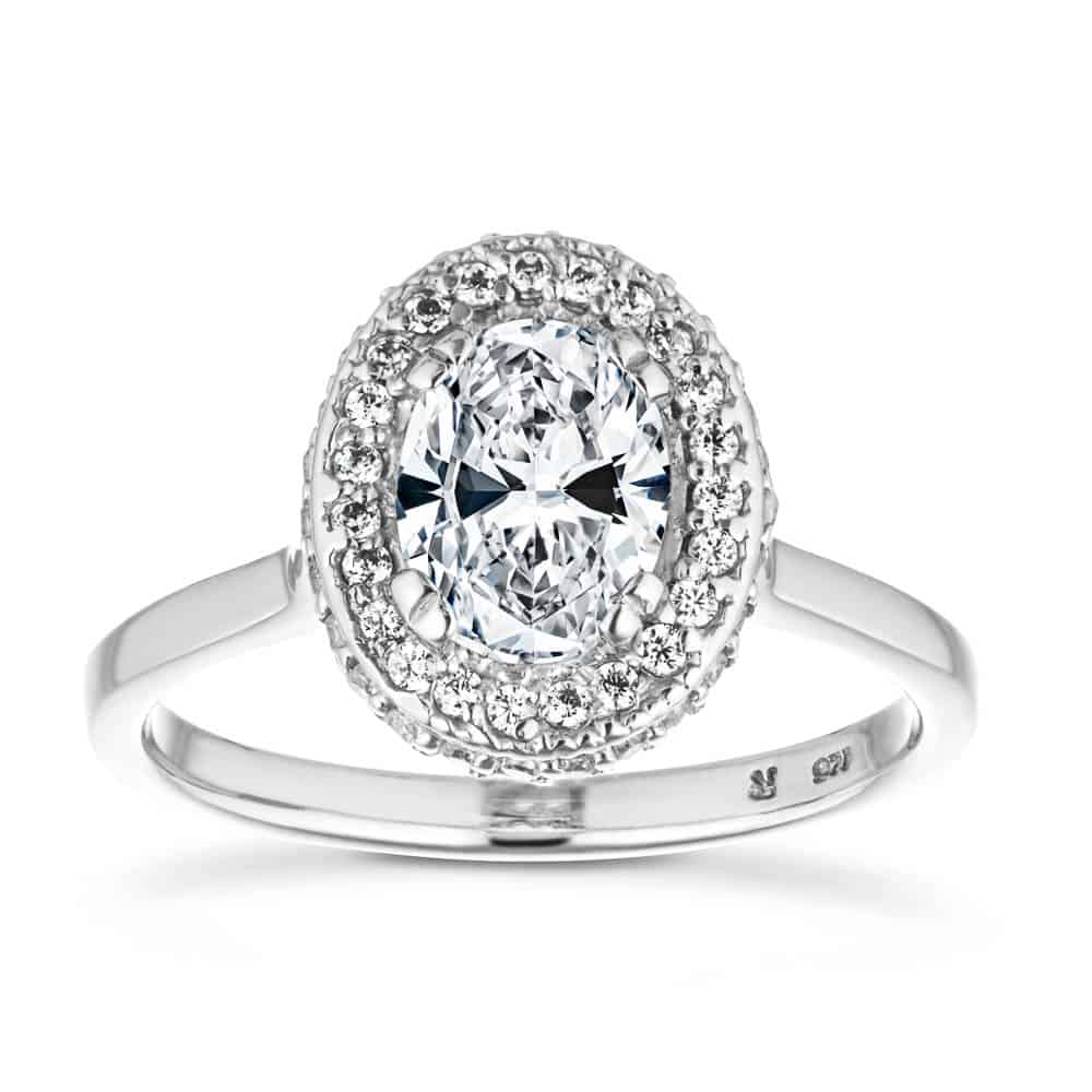 Shown with 1ct Oval Cut Lab Grown Diamond in 14k White Gold|Beautiful vintage style diamond accented halo engagement ring with 1ct oval cut lab grown diamond in 14k white gold band with filigree and milgrain detailing