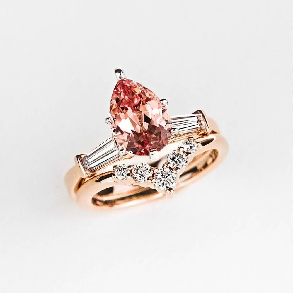Set with a 2ct pear-shaped lab-grown Champagne Sapphire center stone in rose gold. Shown here with the "V Band" also in rose gold | Lab-grown Champagne Sapphire pear three stone ring