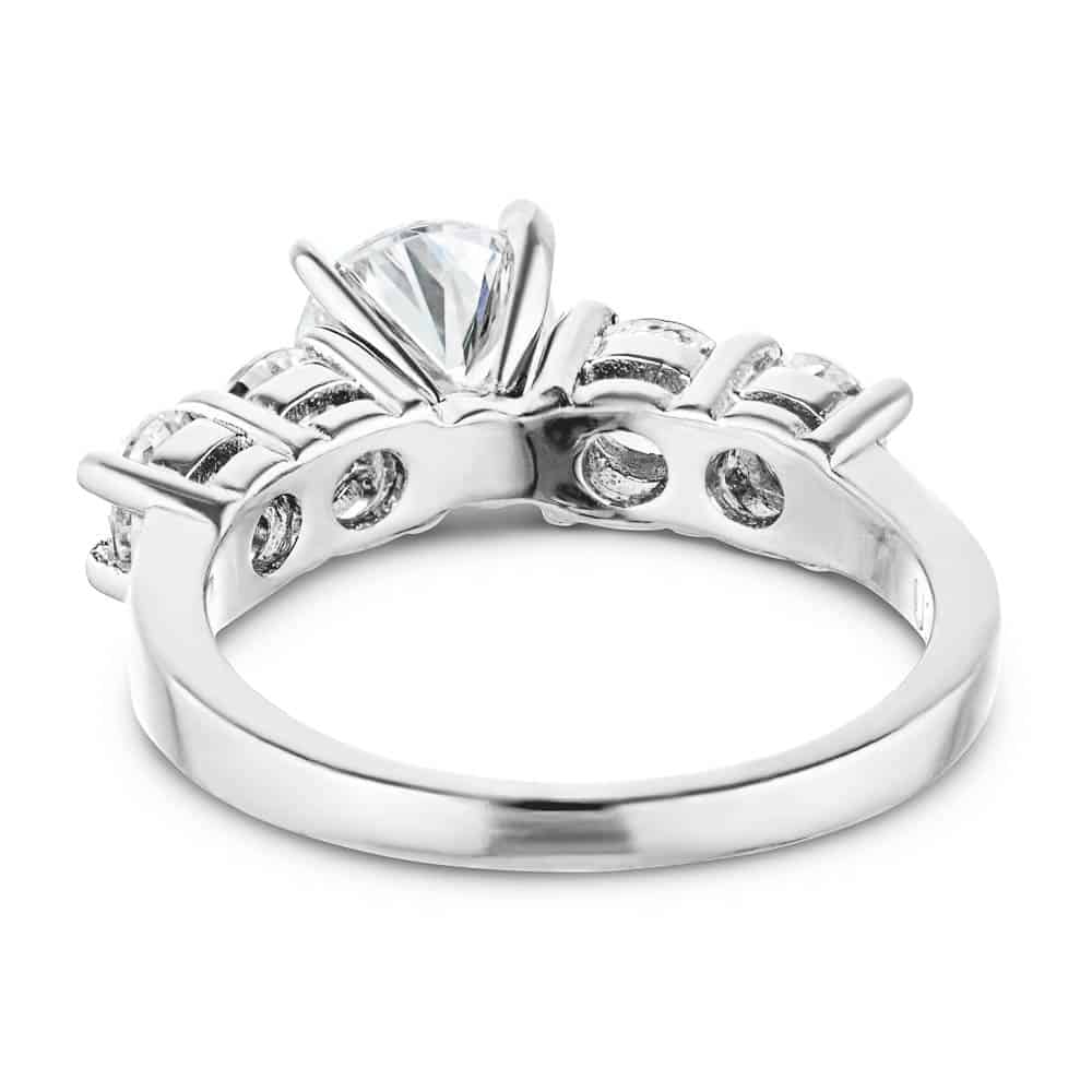 Shown with a 1ct Round Cut Lab Grown Diamond Center Stone amid four 0.25ct Diamond Hybrids in 14k White Gold|Accented engagement ring with a 1ct round cut lab grown diamond amid diamond hybrid simulants totaling 1ctw in 14k white gold shown from back