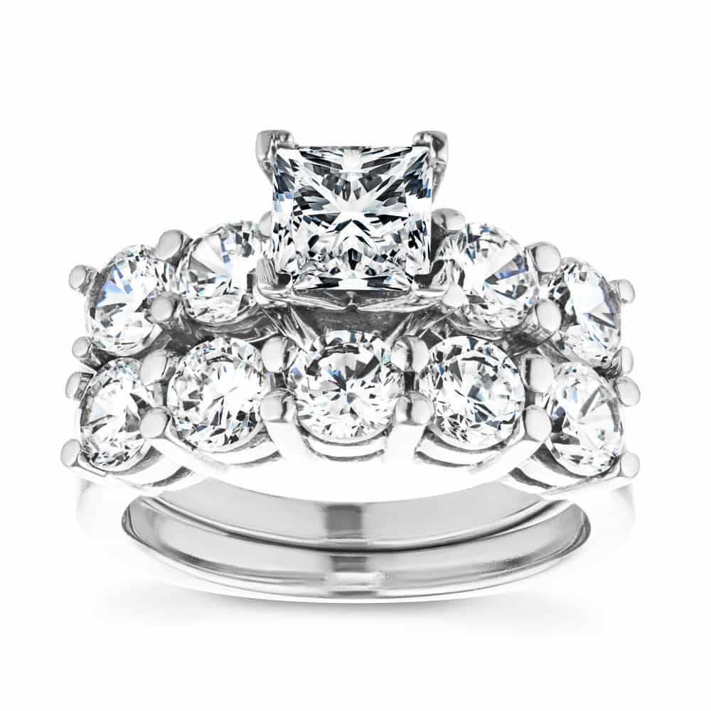 Shown with a 1.0ct Princess cut Lab-Grown Diamond center stone with 1.0ctw Diamond Hybrid side stones in recycled 14K white gold with matching wedding band | matching wedding set Shown with a 1.0ct Princess cut Lab-Grown Diamond center stone with 1.0ctw Diamond Hybrid side stones in recycled 14K white gold with matching wedding band