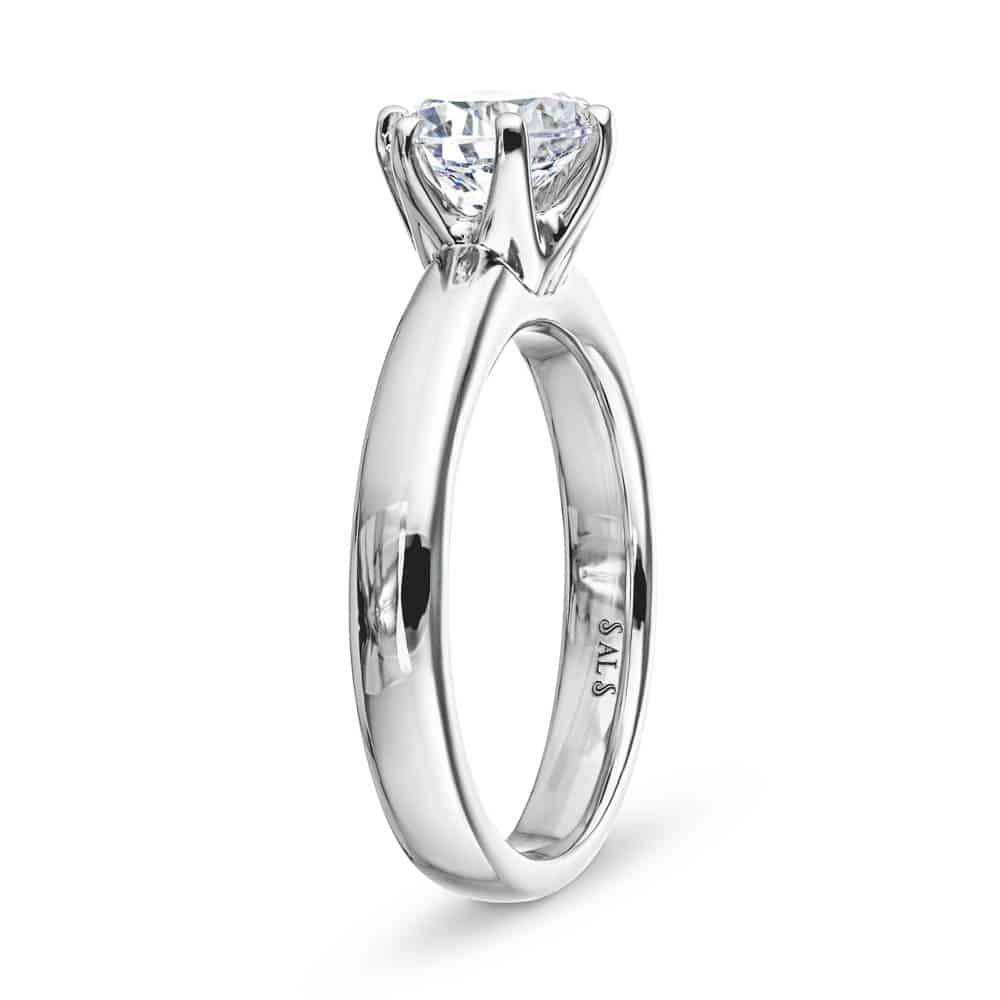 Shown with 1.5ct Round Cut Lab Grown Diamond in 14k White Gold|Simple solitaire engagement ring with 6 prong head set 1.5ct round cut lab grown diamond in 14k white gold shown from side