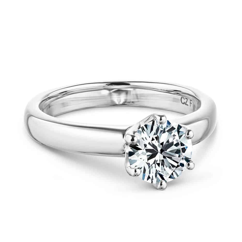 Shown with 1.5ct Round Cut Lab Grown Diamond in 14k White Gold