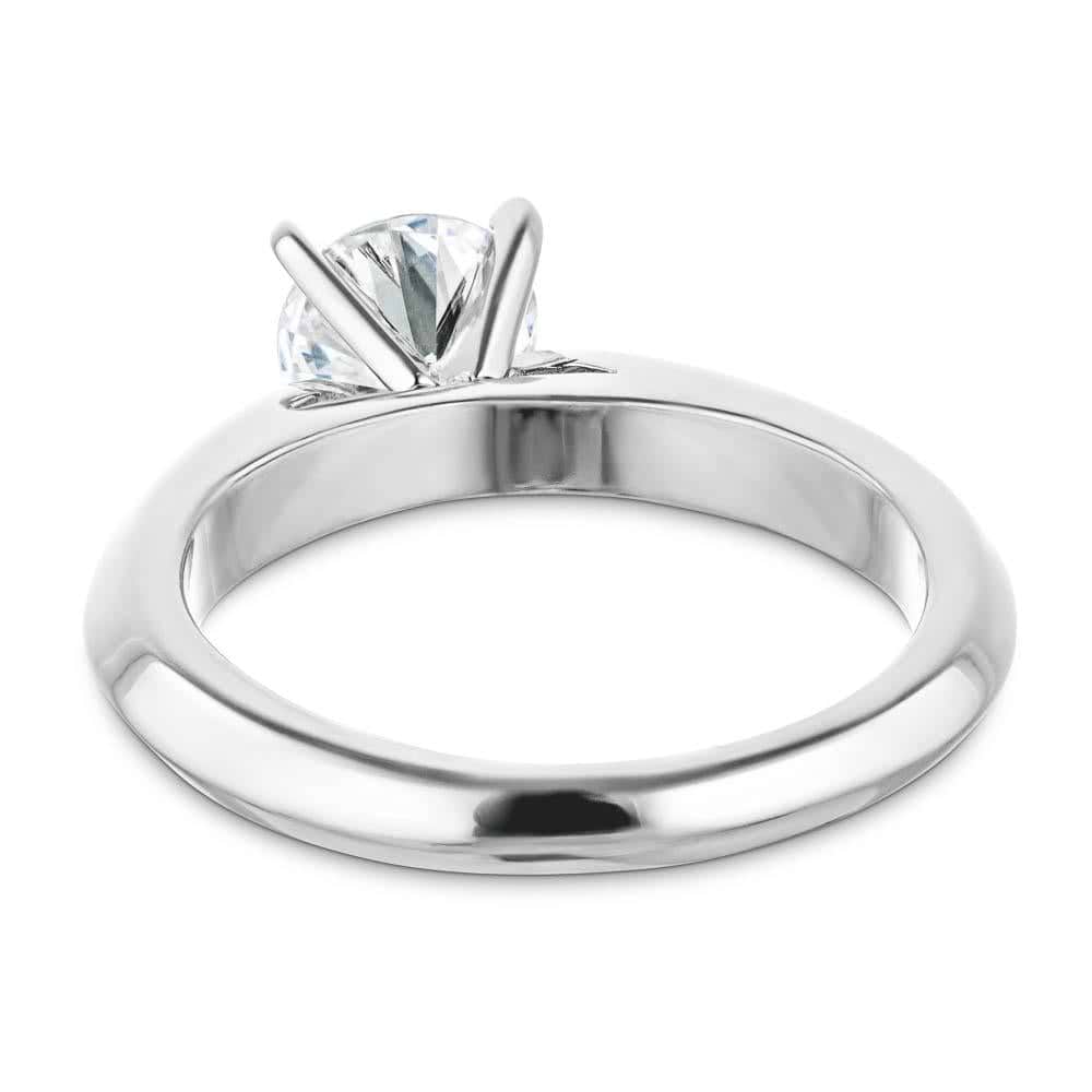 Shown with 1ct Round Cut Lab Grown Diamond in 14k White Gold|Simple solitaire engagement ring with cathedral design holding a 1ct round cut lab grown diamond in 14k white gold shown from back