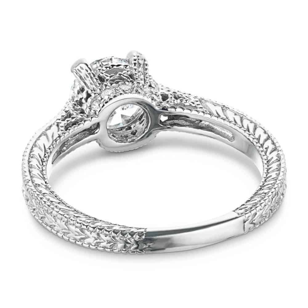 Shown with 1ct Round Cut Lab Grown Diamond in 14k White Gold|Antique style diamond accented engagement ring with 1ct round cut lab grown diamond in 14k white gold filigree detailed band shown from back