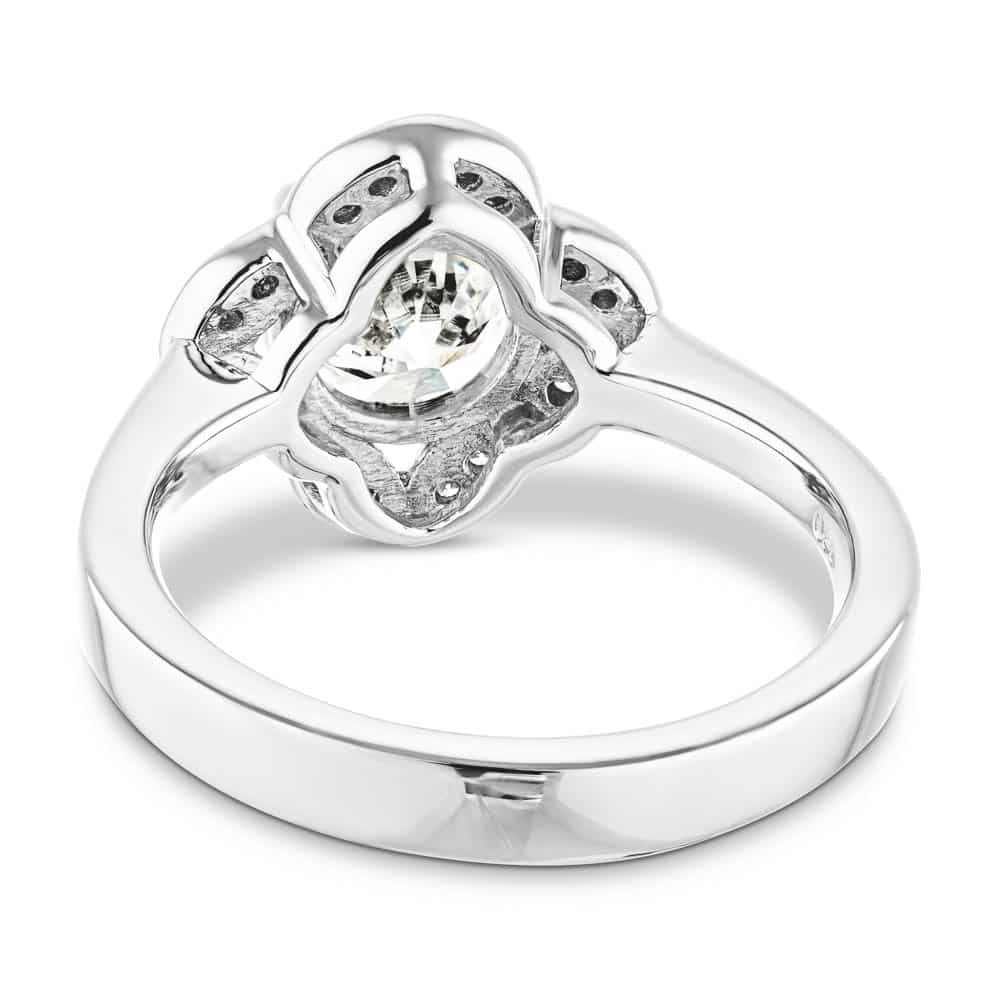 Shown with 1ct round cut lab grown diamond in 14k white gold|Nature inspired vintage style engagement ring with floral petal halo design around a 1ct round cut lab diamond in 14k white gold