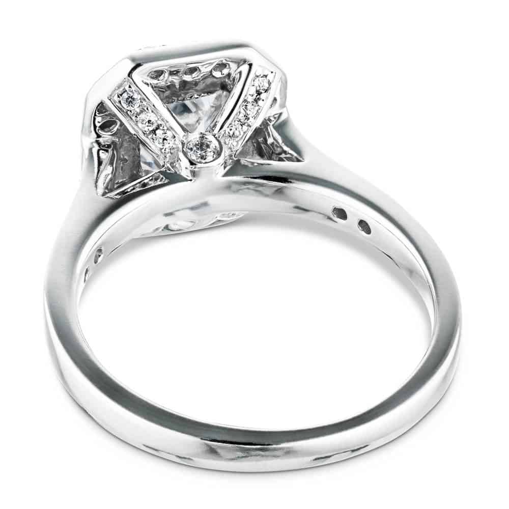 Shown with 1ct Emerald Cut Lab Grown Diamond in 14k White Gold|Antique style accented halo engagement ring with 1ct emerald cut lab grown diamond and peek-a-boo diamonds in 14k white gold shown from back