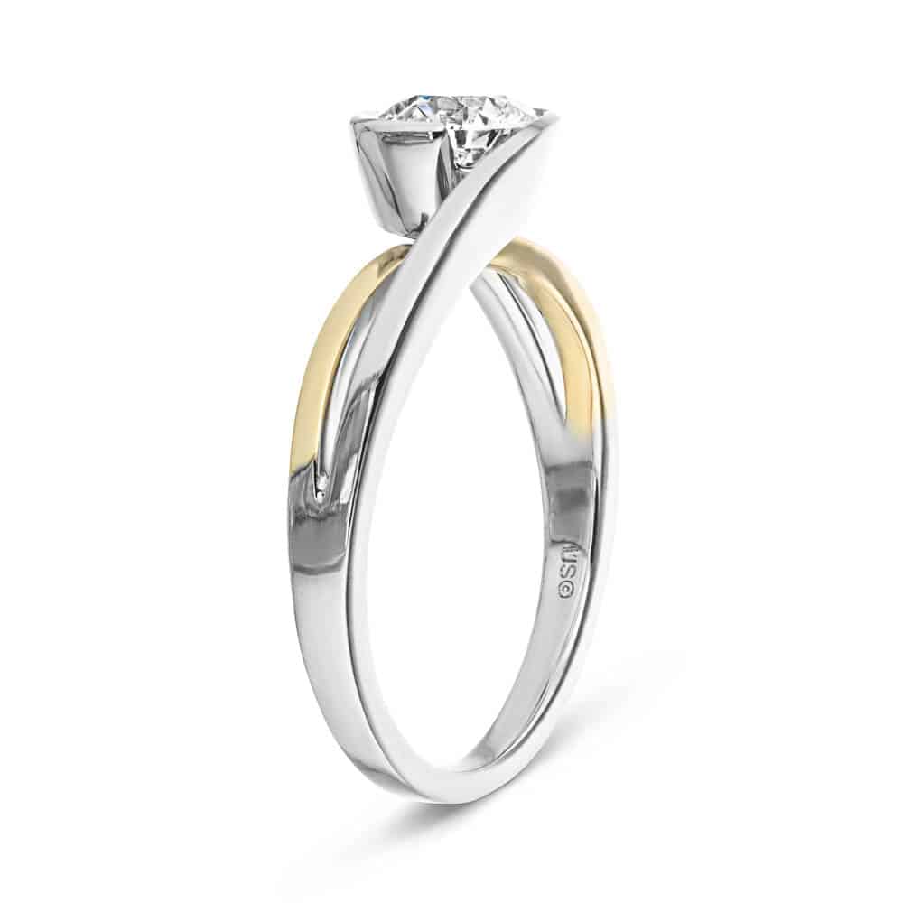 Shown with 1ct Round Cut Lab Grown Diamond in Two Tone 14k White & Yellow Gold|Modern two tone engagement ring with 1ct round cut lab grown diamond set in 14k white gold and 14k yellow shown from side