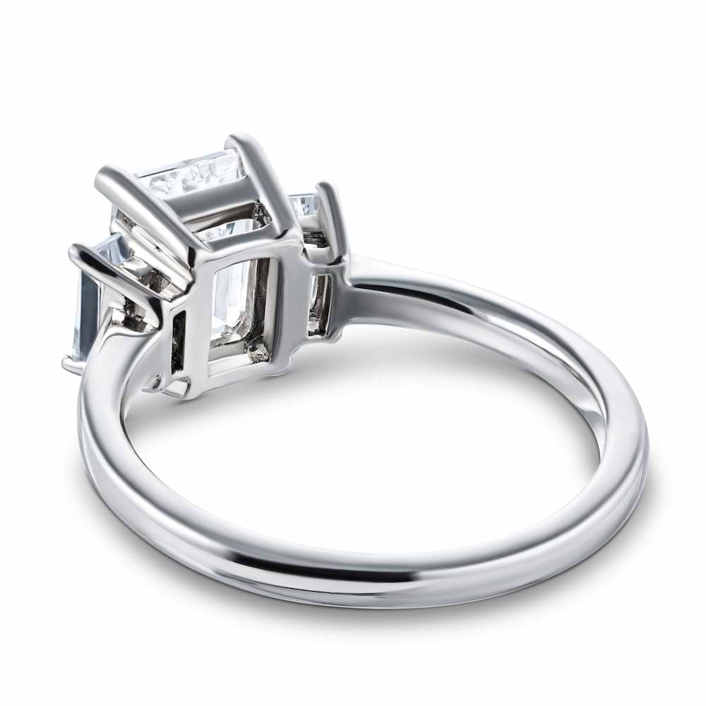 Shown with 1.75ct Emerald Cut Lab Grown Diamond in 14 White Gold|Basket set three stone ring with lab grown diamonds in 14k white gold shown from back